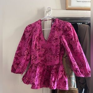 Pink patterned peplum top